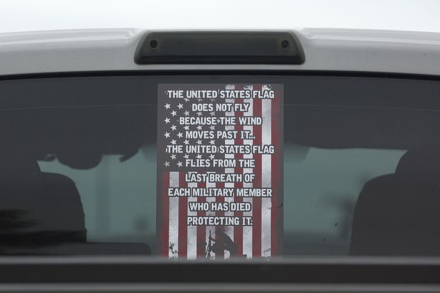 In a grim irony, the Ford F150 truck she drives has a large decal on the back window paying tribute to fallen US servicemen