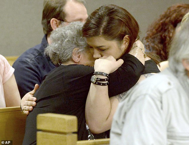 Cordell Richard's mother Ruby Richards and Cordell's daughter Rei Richards embrace in court last week after the two killers were jailed for life