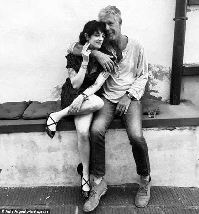 Happy together: Argento shared a photo of herself and Bourdain last week in Firenze (above) that showed them embracing after wrapping a new episode of Bourdain's show.