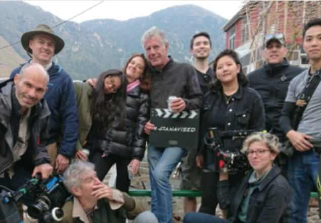 Fan: Bourdain said in a blog post last week that when the director he had hired to shoot the episode had to undergo emergency surgery he hired Argento to take over, noting it was 'fair to say' he and the actress were 'quite close.' (Bourdain and Argento filming the Hong Kong episode that aired this week with the crew above)