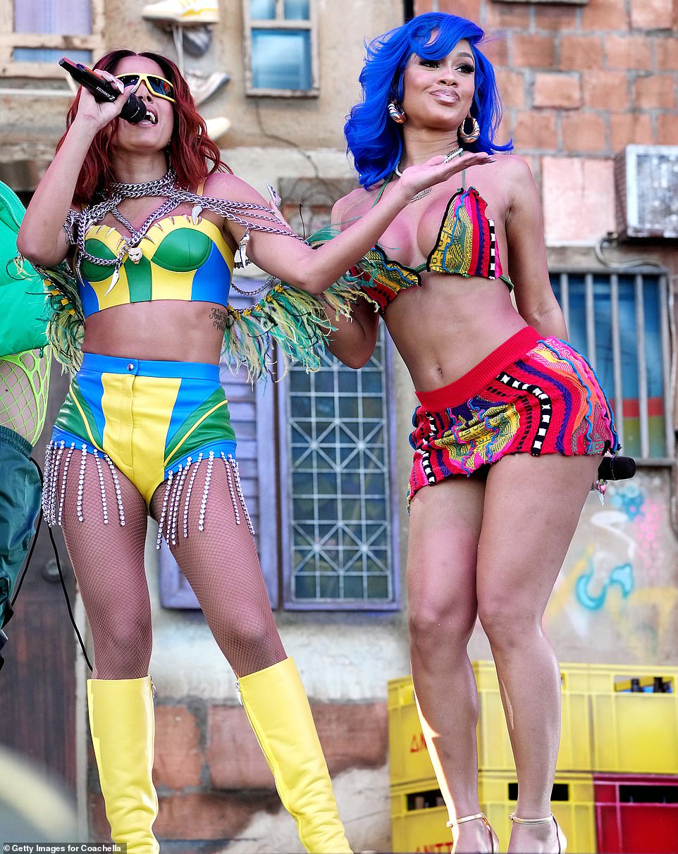Total pro: The 28-year-old rapper was performing onstage with Brazilian singer Anitta in a skimpy two-piece when the wardrobe malfunction occurred, although she appeared to be unfazed by the incident