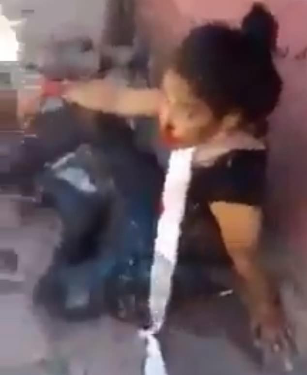María Guadalupe López Esquivel apareció en un video filmado por militares mexicanos que luchan por respirar tras resultar heridos en un ataque el viernes en el central estado de Michoacán.